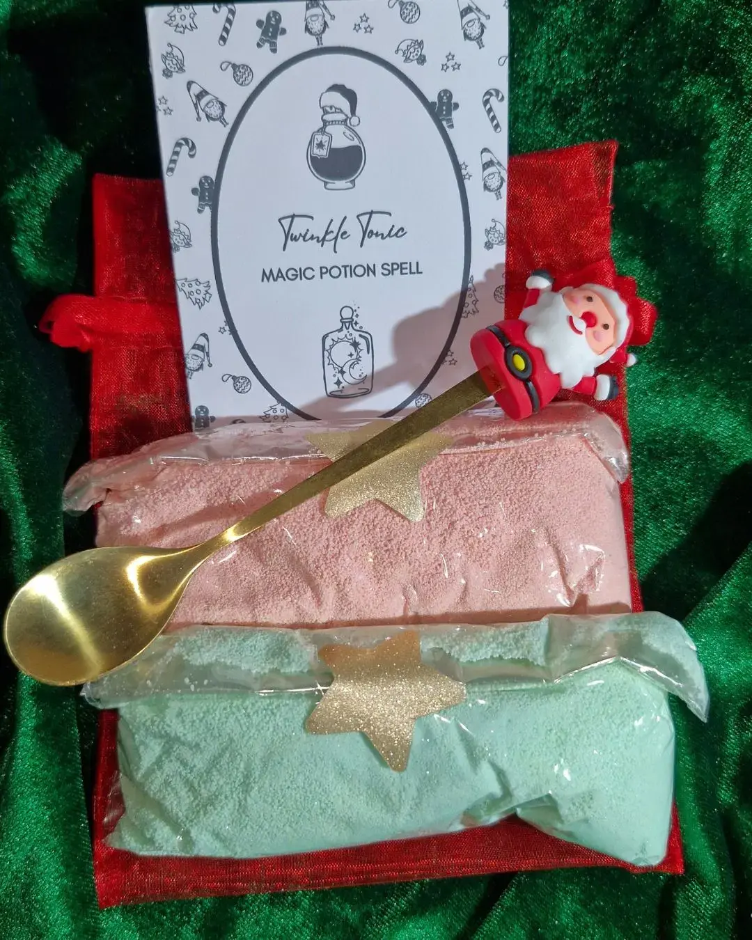 Mini Magic Potion – Twinkle Tonic Christmas kit by Sparkle & Spell Co. NZ, featuring red and green potion powders, a gold spoon with a Santa topper, and Christmas-themed packaging. A festive stocking stuffer for kids.